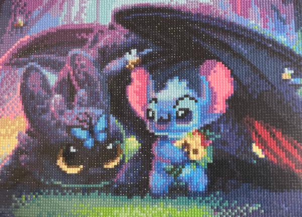 A gem art portait of Toothless and Stitch.